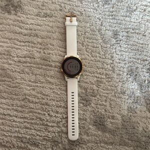 Garmin Smartwatch with White Band and Gold Trim